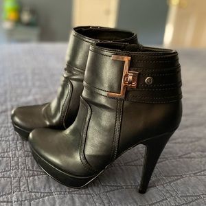 High heeled boots by GUESS size 7.5